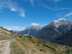 Hiking trail with Sent and mountain panorama in the background